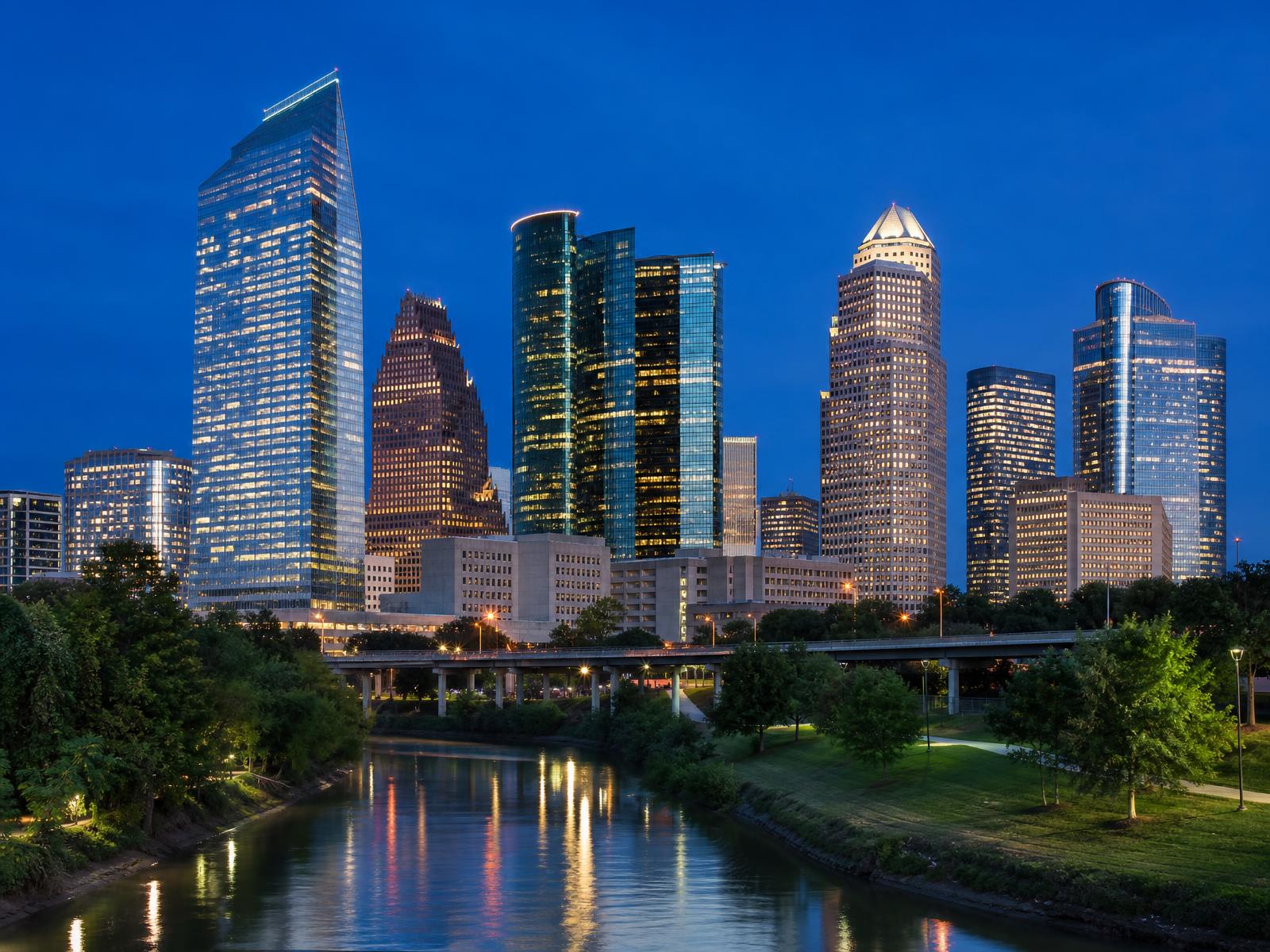 Downtown Houston, Texas skyline at dusk seen from Buffalo Bayou